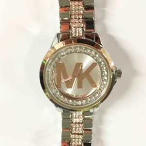 Women’s Michael Kors watch gold